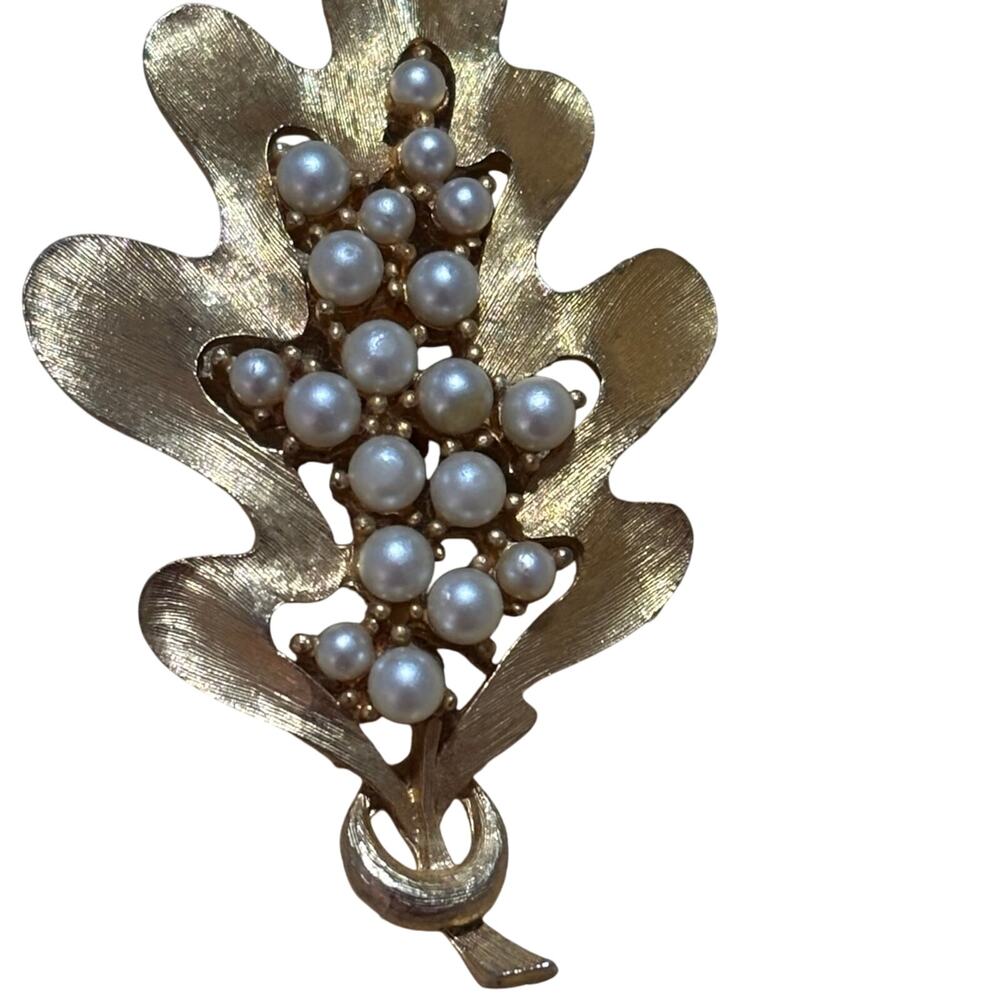 Vintage gold tone leaf and faux pearl brooch signed J.J.
